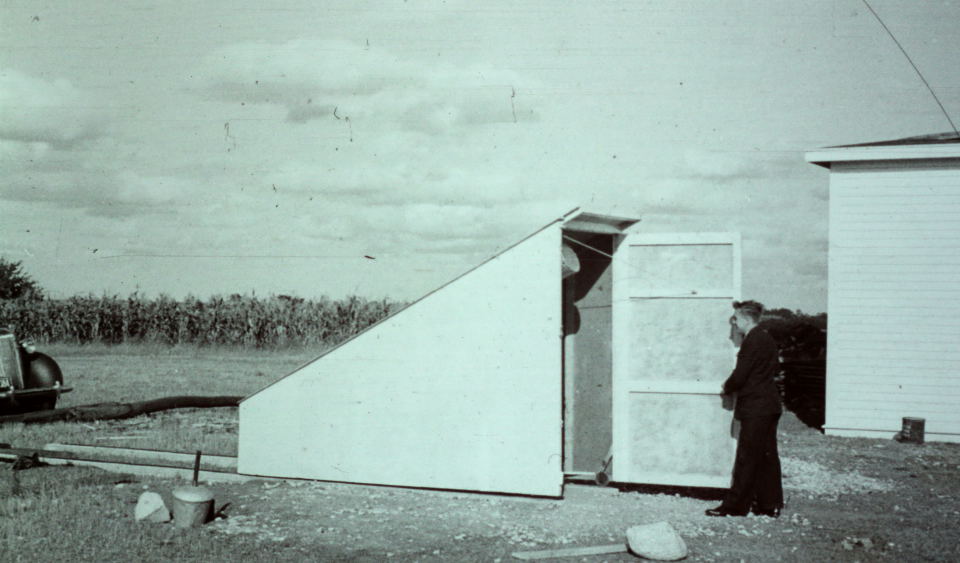 A.C. Tabbatt opening the door