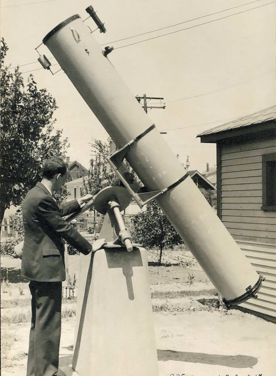 C.P. Frister standing next to the Armfield Telescope. Frister was one of several members involved in the construction of this scope.