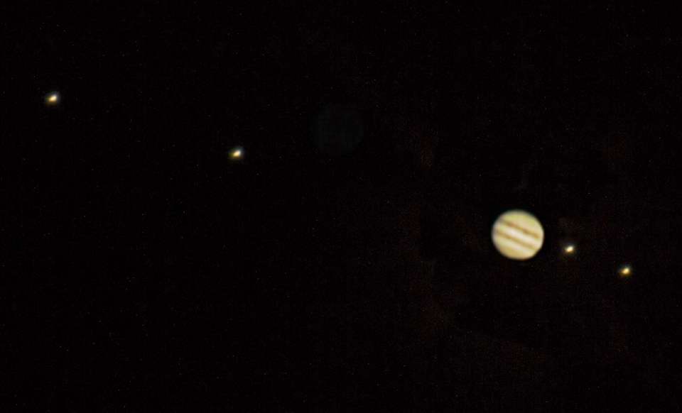 Jupiter and 4 Galilean moons in a small telescope